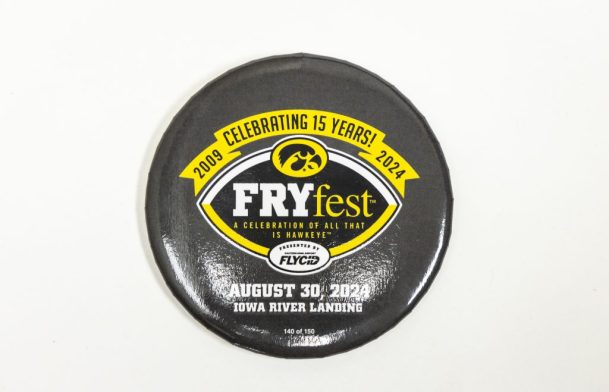 A button for FRYfest, celebrating 15 years at the Iowa River Landing, is seen, Monday, July 15, 2024, at the Iowa City/Coralville Area Convention & Visitors Bureau in Coralville, Iowa. MANDATORY CREDIT: Joseph Cress/Think Iowa City