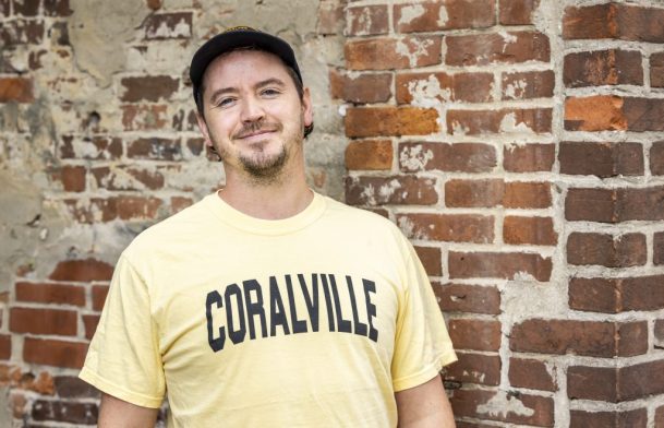 Steve wears a yellow Coralville shirt for a Shop Think Iowa City merchandise photo shoot, Friday, Sept. 13, 2024, in Iowa City, Iowa. MANDATORY CREDIT: Joseph Cress/Think Iowa City