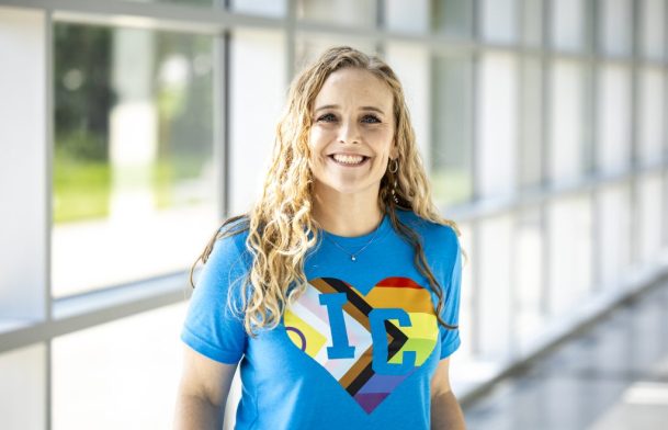 Ashley Smith models a blue t-shirt with the Rainbow IC Heart logo for Shop Think Iowa City marketing, Thursday, June 5, 2025, in Iowa City, Iowa. MANDATORY CREDIT: Joseph Cress/Think Iowa City